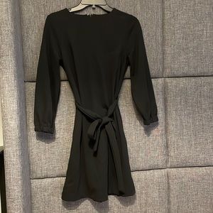Gap black knee length dress. Tie waist. Never worn, brand new with tags size 0.